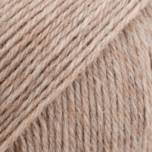 Drops Fabel - Uni print, 127 sand