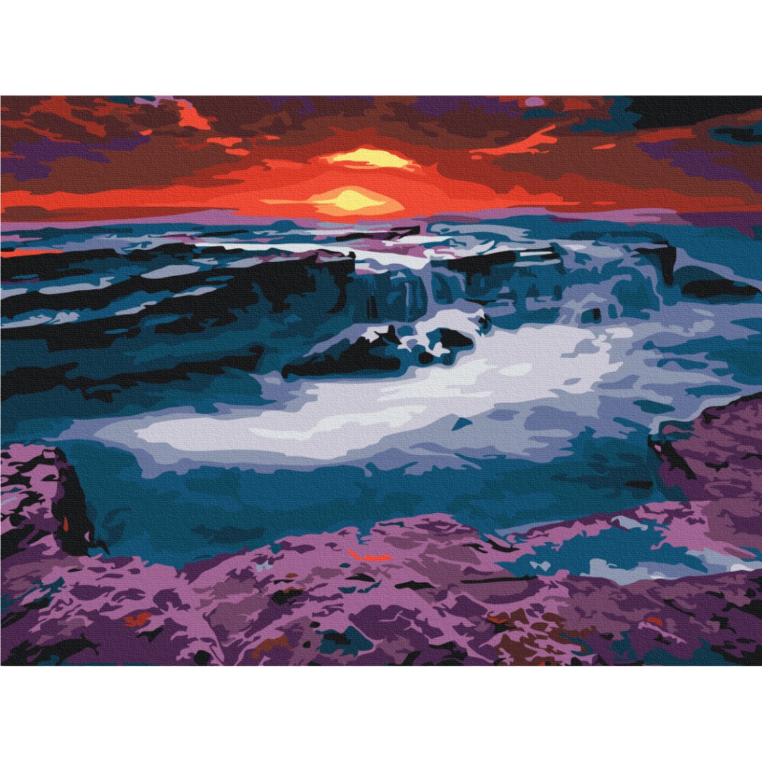 Захід сонця біля водоспаду